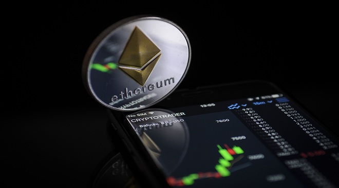 A replica "ether" cryptocurrency coin in seen in this photo illustration on November 8, 2017. Ether is a token in a distributed network computing system named Ethereum which allows the cryptocurrency to be used and traded. (Photo by Jaap Arriens/Sipa USA) (Photo by Jaap Arriens/NurPhoto via Getty Images)
